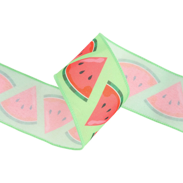 The 2.5 Inch Watermelon Slice on Green Ribbon (9320W-555-63E) features pink watermelon slices with green rind and black seeds against a white dupioni background, accented by a light green ribbon.