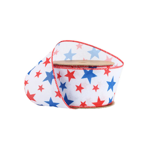 The 2.5 White with Red and Blue Stars Wired Ribbon (9500W-029-63E) features a patriotic design with red and blue stars on white, accented by red edges.