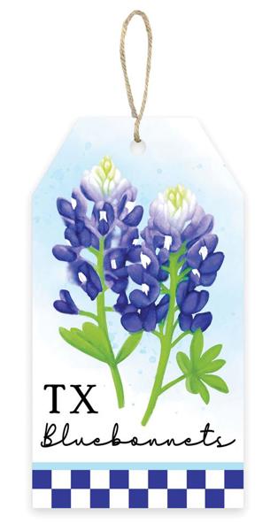 The 12 H x 6.5 Light Blue/Indigo/White Texas Bluebonnets Tag Sign (AP7268) illustrates two bluebonnets with green leaves on a light blue background, features TX Bluebonnets in black cursive, a checkered blue and white bottom edge, and includes a string loop for easy display.