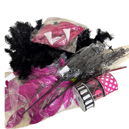 The McKenzie Cole Halloween Swag with Vampire Lips Wreath Kit 08092025 includes vampire lips with fangs, black branches, sparkly pink leaves, and black and pink swag ribbon with skull and polka dot designs—perfect for Halloween decor.