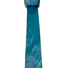 A spool of 2.5 light blue velvet ribbon with a satin back unrolls on a white background, its luxurious texture and vibrant gold edges beautifully contrasting against the plain scene.