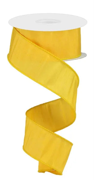 A spool of Golden Yellow Faux Dupioni Ribbon (1.5" x 10 yds, RD1101R1) with a wavy strand hanging in a spiral against a white background.