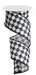 A spool of 2.5 x 10 YD Black and Cream Antique Diamond Plaid Ribbon (RG116794) with an elegant black and cream checkered pattern unfurls gracefully in a spiral.