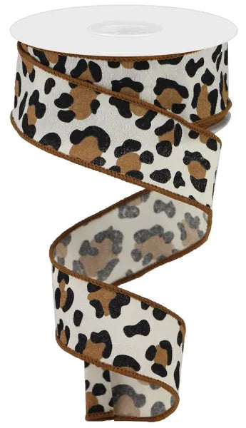A spool of Natural Black Brown Leopard Print/Fuzzy Fabric Ribbon, 1.5 inches wide by 10 yards (RGB140618), with a soft brown, black, and tan pattern, partially unwound in a loose spiral.