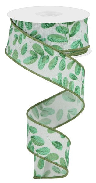 A spool of 1.5x10yd White Blue Green Dk Green and Sage Bold Leaves on Royal Ribbon (RGC119727) is unspooled in a loose spiral, showcasing its nature-inspired leaf pattern and elegant thin green edges.