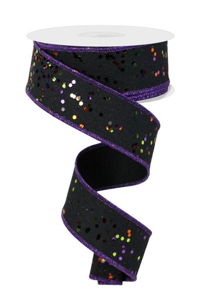 A 1.5 x 10yd Black/Orange/Purple/Lime Sprinkled Hex Glitter Finish Ribbon (RGE1253YR), unspooled in a spiral, adds a sparkling, playful accent with its colorful glitter spots and shimmering purple edges.