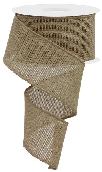 A 2.5X10Yd Light Beige Faux Burlap Ribbon (RGE140201) is unrolling in a loose spiral, showing its coarse and textured weave.