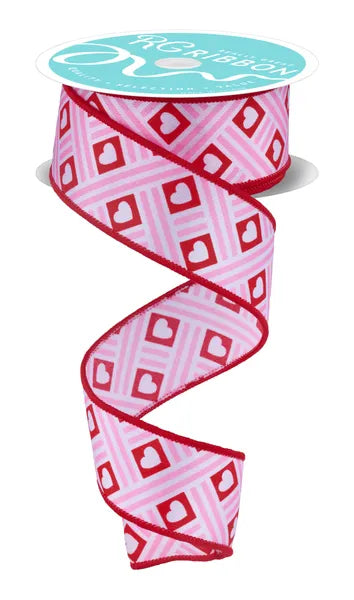 The 1.5X10YD White Red Pink Hearts/Stripes Ribbon (RGF191027) features pink and white geometric patterns, red squares, white hearts, and red edging—ideal for adding charming color to any project.