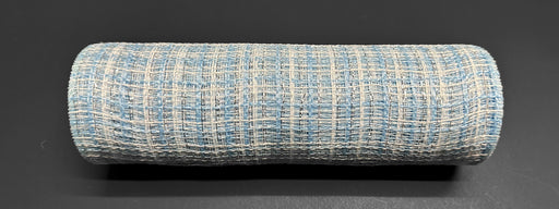 The product "10\"X10Y Lt Blue-White-Silver Metallic Tweed Mesh XB235710-04" is a cylindrical, textured object resembling a fabric roll, showcasing a woven pattern in metallic tweed with light blue and off-white threads that subtly glimmer on its dark surface.