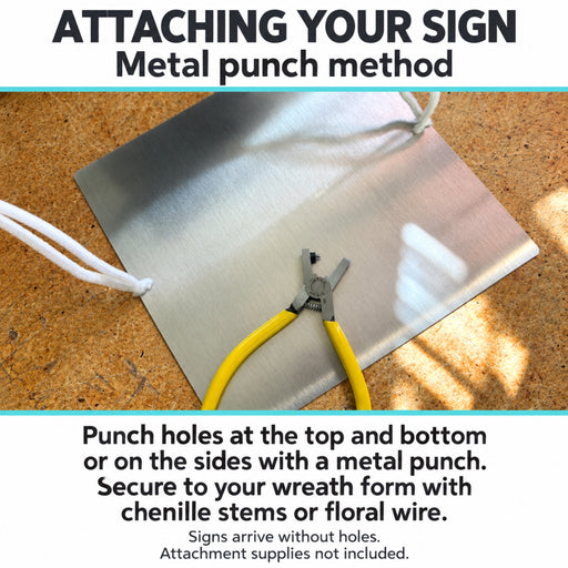 Back of a flat metal wreath sign showing punched holes and chenille stems used to attach the sign to a wreath form. Signs are shipped without holes.