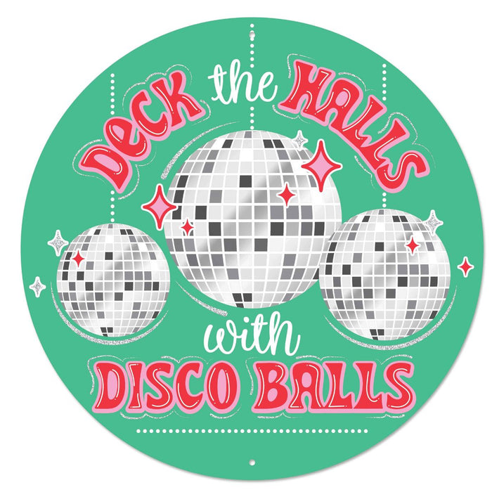 12 inch round metal sign with dark mint green background reading Deck The Halls with Disco Balls featuring silver disco balls and red and pink lettering.