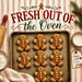 Fresh Out of the Oven Christmas metal sign featuring smiling gingerbread cookies on a baking tray with festive holiday baking accents. Exclusive Trendy Tree Design. SKU TTE-517.