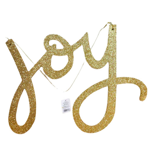 The 15" Gold Joy Ornament 4546015, part of the Holly Jolly Holiday Collection, features glittery cursive "joy" letters in gold, hanging by a thin string 
