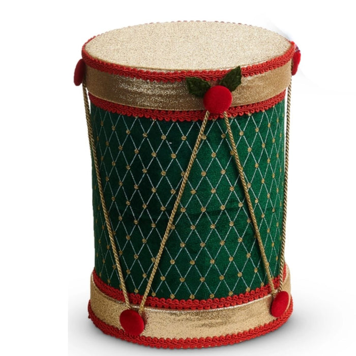 Add festive charm to your Christmas decor with the 12″ Red or Green Velvet Christmas Drum (RAZ 4603582). Available in red or green velvet, each drum features elegant gold trim, bright red pom-poms, and a crisscrossed gold string pattern. Inspired by the classic RAZ Imports design, these decorative accents stand upright on a white background and bring timeless holiday cheer to any space.