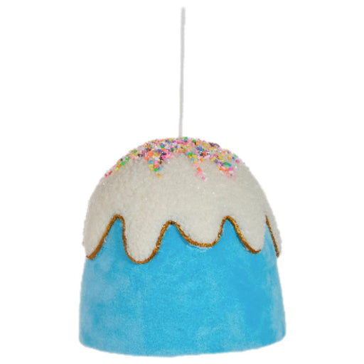 Four 6" Gumdrop Button Ornaments (4503495) shaped like frosted cakes in blue, pink, red, and green with white icing and sprinkles hang by white strings—part of the Holly Jolly Holiday Collection.