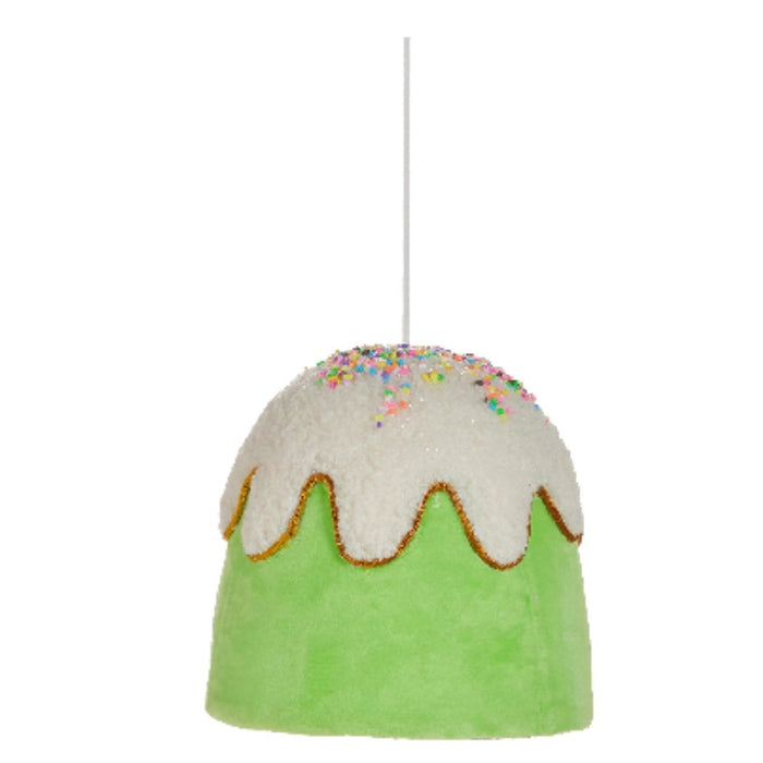 Four 6" Gumdrop Button Ornaments (4503495) shaped like frosted cakes in blue, pink, red, and green with white icing and sprinkles hang by white strings—part of the Holly Jolly Holiday Collection.