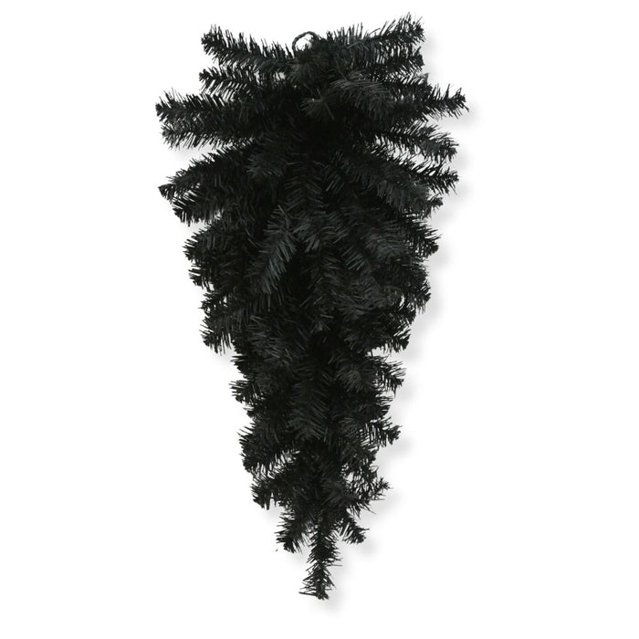 The 24" Black Artificial Pine Teardrop Swag 82298-BK features an elegant upside-down cone arrangement of dark pine branches, creating a striking gothic accent that stands out beautifully against a white background—ideal for adding dramatic Halloween or moody decor to your space.