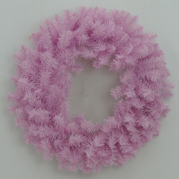 A 24" Pink Artificial Pine Wreath (82295-PK), crafted from light pink artificial pine branches and arranged in a perfect circle against a plain light background, adds a unique and stylish touch to your seasonal décor.