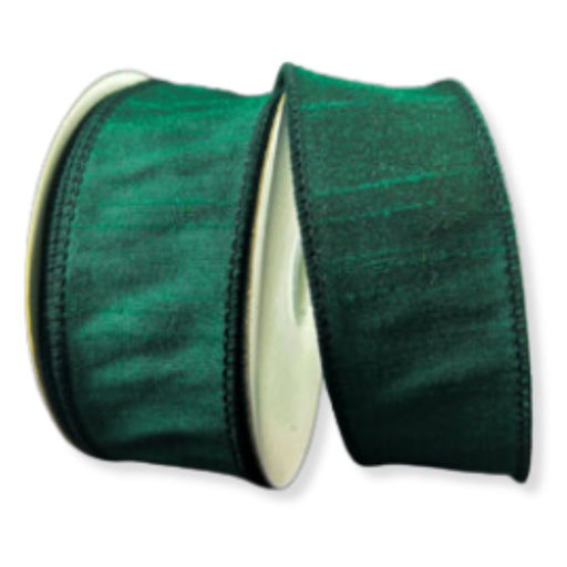 Two rolls of 1.5" Hunter Green Faux Dupioni Wired Ribbon (10 yards each, 72434-09-07) are placed side by side, partially unspooled. The slightly shiny, faux dupioni-style ribbons are wound around white cylindrical spools.