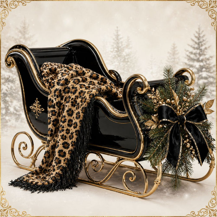 Black Christmas sleigh 10 inch metal sign with gold trim, leopard animal print throw, evergreen greenery and black bow, TTE-658.