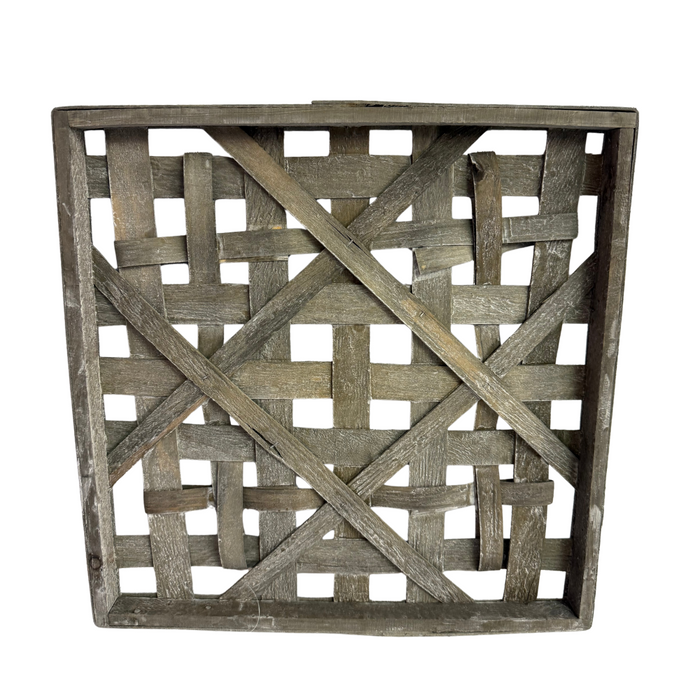 The 16 Gray Wash Woven Frame Square M10537 is a rustic wooden tray with a weathered finish, open crisscross lattice design, visible wood grain, and diagonal supports forming an X across the center.