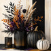 Modern Halloween metal wreath sign with black and white pumpkins, black purple and orange floral arrangement, gold accents and striped background, TTE-611.