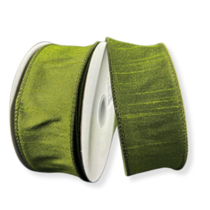 Two spools of 1.5" Moss Green Faux Dupioni Wired Ribbon (10 yards each, #72434-09-08) are placed side by side on a white background. These elegant ribbons feature a faux dupioni texture and wired edges, making them ideal for sophisticated crafting or gift wrapping projects.
