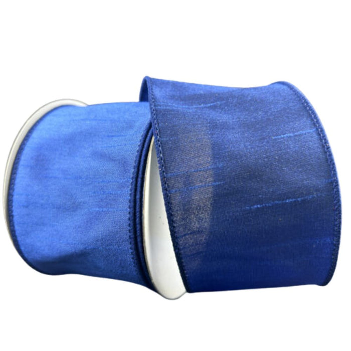 A spool of 2.5" Navy Faux Dupioni Wired Ribbon (72434-40-27) with a slight sheen, partially unrolled and displayed on a white background—perfect for wreath making supplies.