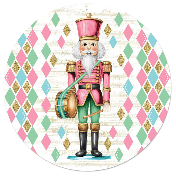 12 inch round pastel glitter nutcracker metal sign in white, light blue, pink, and mint green MD1681C7