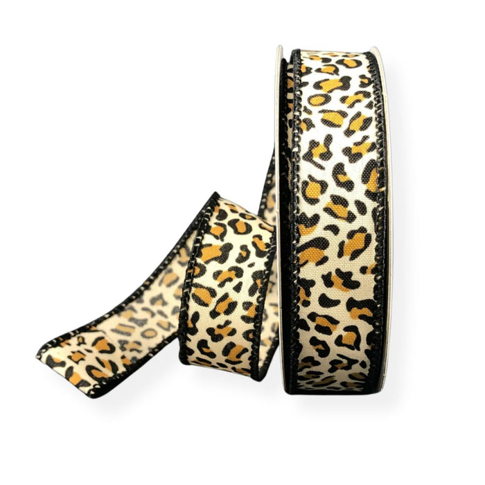 Two spools of Petite Cheetah Animal Print Satin Wired Ribbon, measuring 7/8″ x 10 yards each (61223-05-14), with a yellow, black, and brown cheetah pattern and black stitched edges, are displayed on a white background.