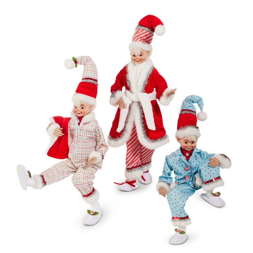 Three festive 18″ Posable Christmas Pajama Elves from RAZ Imports (product code 4602316), dressed in cheerful holiday outfits, stand and pose against a white background—making charming additions to your Christmas decorations.