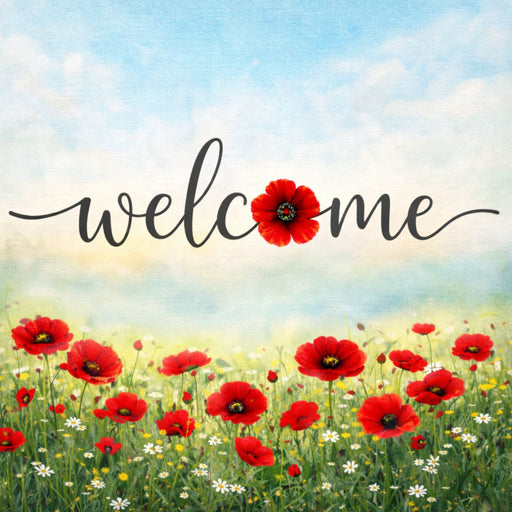 Welcome metal wreath sign with red poppies and wildflowers in a meadow beneath a soft blue sky.