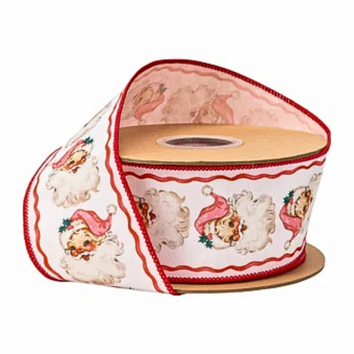 Retro Pink Santa Wired Dupioni Ribbon with Pink Backing 2.5″ x 10 Yards 9750W-150-63E featuring vintage-style illustrations of Santa Claus wearing a pink hat on a white background with a decorative red edge.