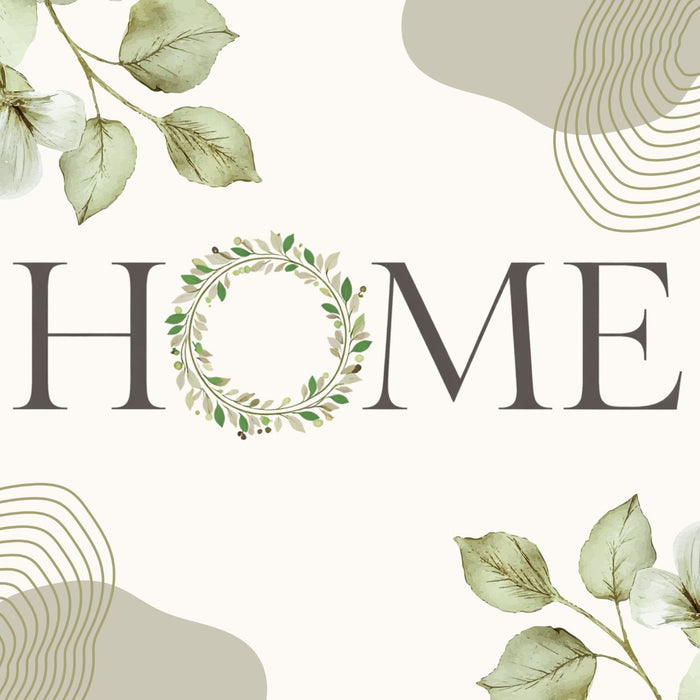 Home metal sign with sage green leaves, light greenery and a botanical wreath forming the letter O.