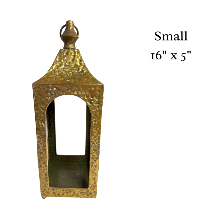 The 16 by 5 Golden Hammered Metal Artisan Lantern (M32600AB) with a hammered finish, arched open window, and rectangular shape is shown on a white background, with size details to the right.