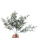 16-inch green and white snowy plastic leaf bush with seven branching stems for Christmas wreaths and winter floral arrangements, XG551916-068.