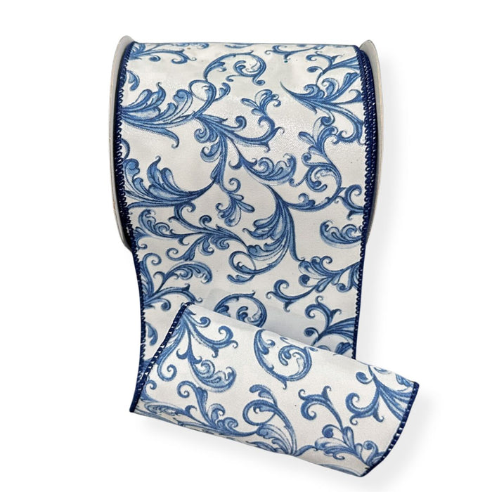Wide white satin wired ribbon with elegant blue chinoiserie swirl pattern and blue edge, 4 inches by 10 yards.