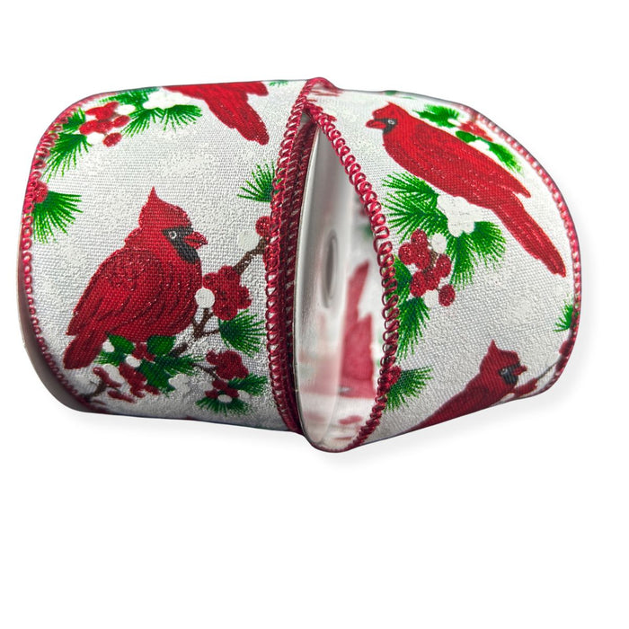 White linen wired Christmas ribbon with red cardinals, pine greenery and red berries, 2.5 inches wide by 10 yards.