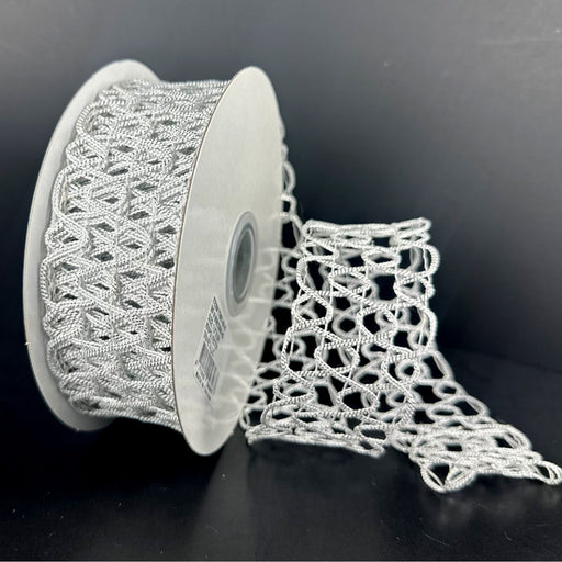White and silver squiggly open weave decorative ribbon, 1.5 inches by 10 yards.