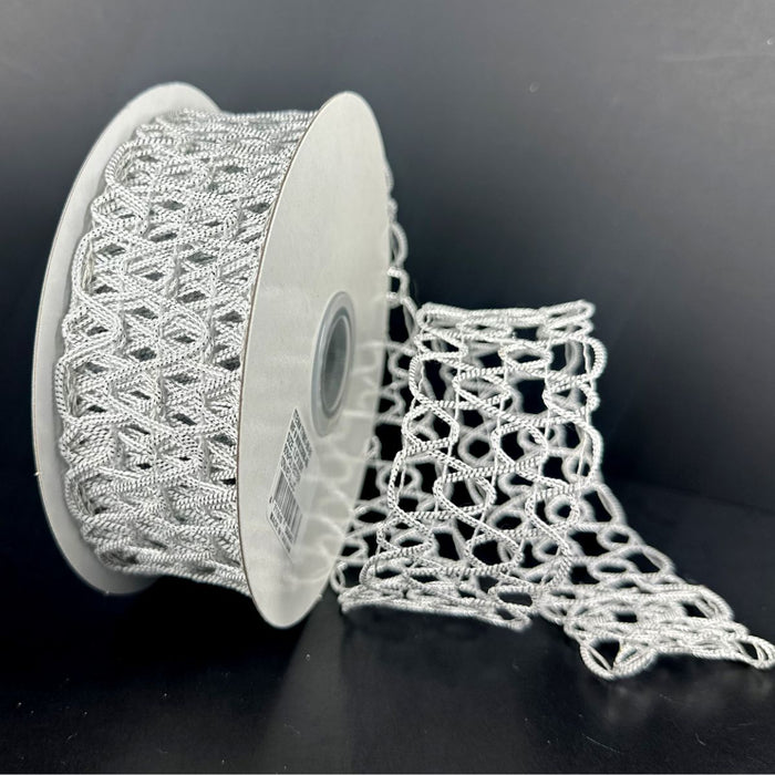 White and silver squiggly open weave decorative ribbon, 1.5 inches by 10 yards.