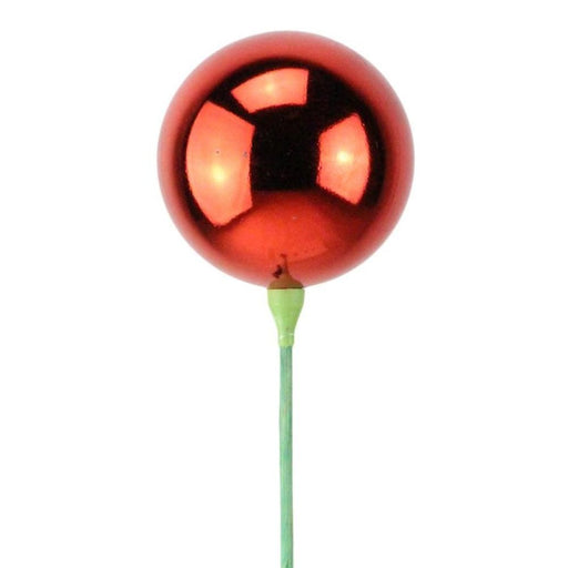A 100mm V.P. Ball on a bamboo pick, standing 20" in overall length and featuring a shiny red finish (XP365224), resembles a small decorative bauble.