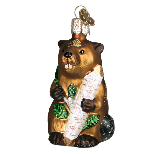 The Eager Beaver Ornament by Old World Christmas (#12194) features a beaver holding a log, decorated with glittery green leaves and a gold-topped loop. With its prominent front teeth and detailed brown and black coloring, it makes a delightful addition to any festive decor.
