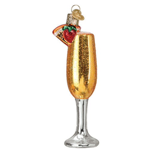 The Mimosa Ornament Old World Christmas 32519 is a hand-painted glass piece shaped like a champagne flute with golden bubbles, topped with a red strawberry, and features a small silver cap for hanging.