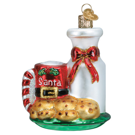The Santas Milk & Cookies Ornament from Old World Christmas (32538) captures the classic snack for Santa with a milk bottle adorned with a red bow, a mug labeled Santa, and festive cookies on a green base.