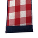 Close-up of the 2.5 Two-Sided Red White Buffalo Plaid Navy Back Ribbon 41146-40-74 detailing its woven texture and visible stitching resembling a decorative hem finish.