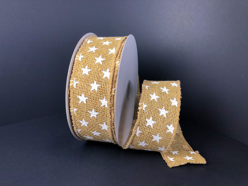 A 1.5X10Y Natural Burlap ribbon with white stars, product code 41222-09-15, unrolls to reveal its charming texture and design against a dark backdrop, emphasizing its rustic appeal.