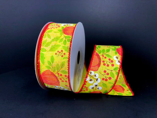 A partially unspooled roll of 1.5X10Y Yellow Linen/Tangerine Peony-Cotton Ribbon (41256-09-24) displays a vibrant design of oranges, leaves, and small red berries on a yellow linen background, reminiscent of a tangerine peony garden.
