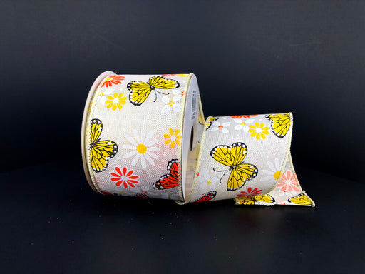 2.5X10Y White Linen/Butterfly-Flowers Ribbon 41332-40-18 features yellow and orange butterflies with daisies on white linen. Wired edges allow easy shaping, shown on a black background—perfect for crafts and decorating.