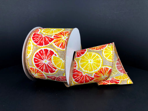 The 2.5X10Y Natural Print Linen/Lemons-Oranges Ribbon 41334-40-14 showcases a vibrant pattern, with colorful citrus slices like lemons and oranges against a dark backdrop.
