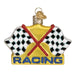 The Racing Flags Old World Christmas Ornament 44153 is mouth-blown glass with two crossed checkered flags and a red border. RACING sparkles in blue glitter on a gold background. It has a small gold loop on top for easy hanging.